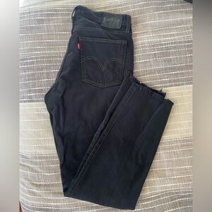 Levi’s distressed black denim jeans